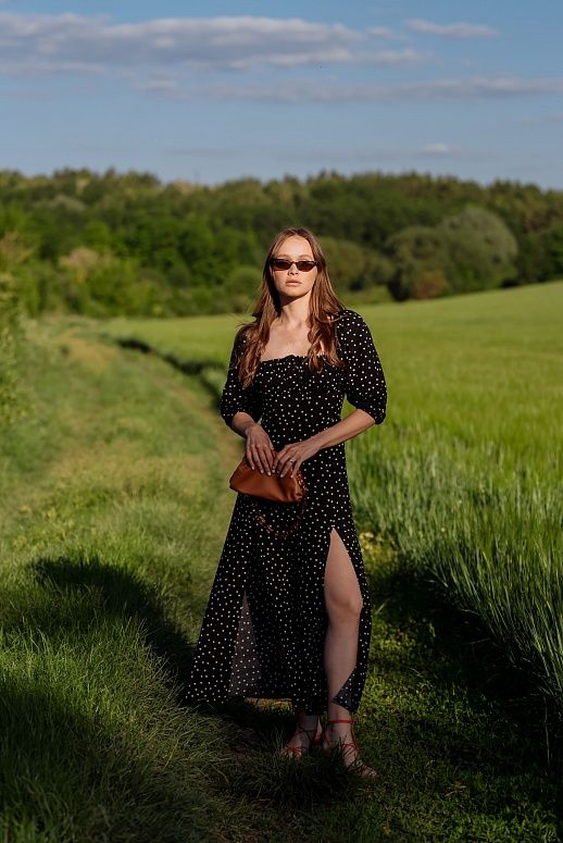 Сукня міді з двома роспірками чорна в великий горох